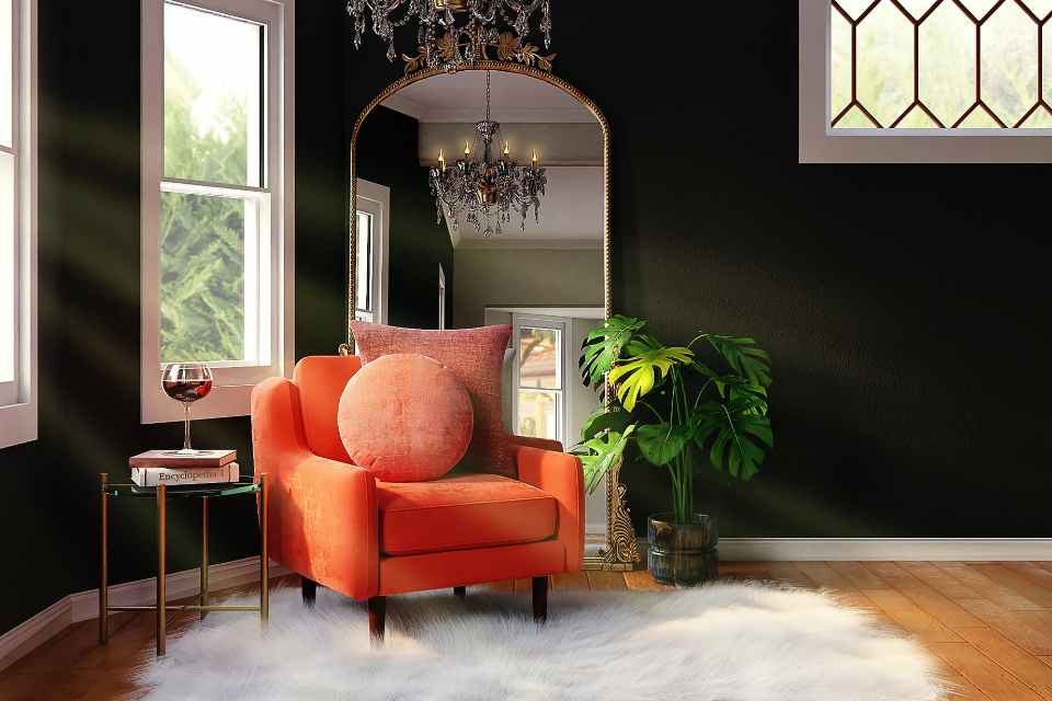 moody drama style living room with arched mirror and jewel tones